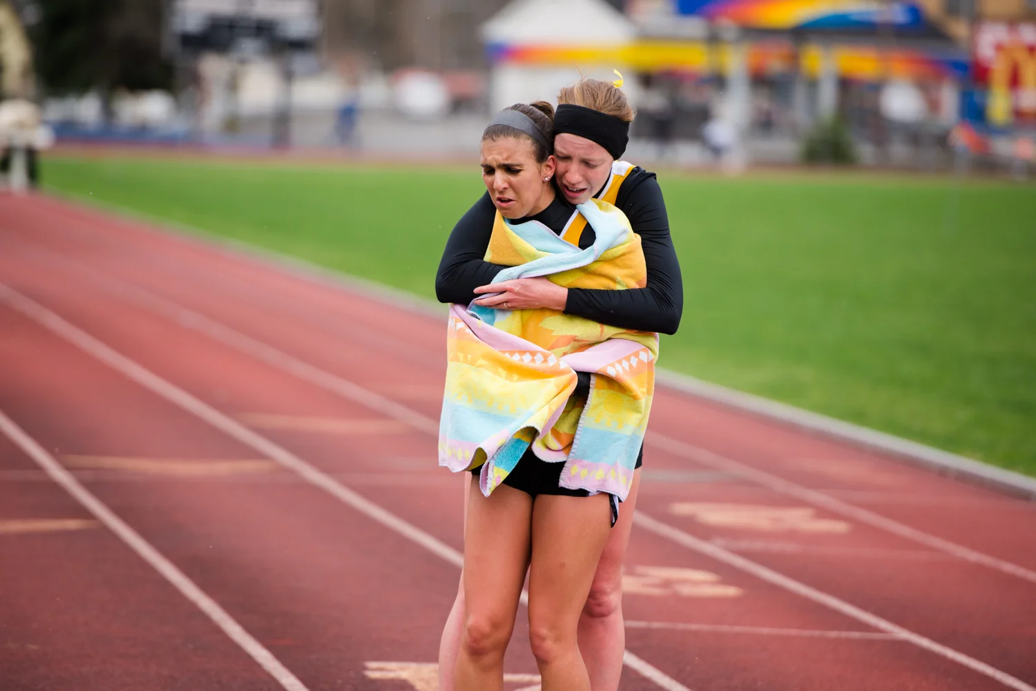  Two Geneva runners&nbsp;commiserate together after completing the steeplechase event. 